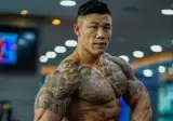 아이를 낳고 몸에 문신을 후회중인 헬스 유튜버.jpg