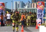 순직 동료 기리며 20kg장비메고 100층 계단 오른 소방관들